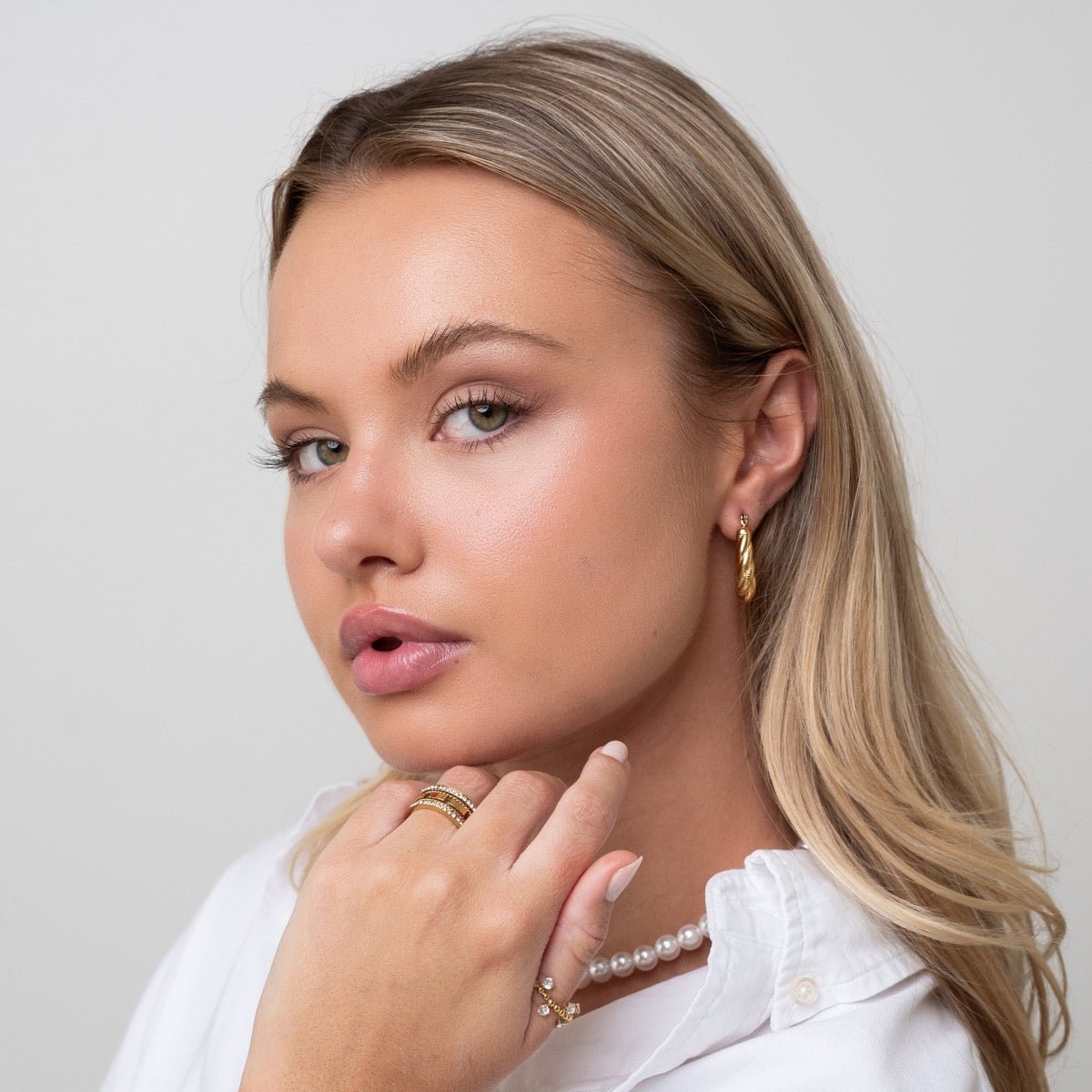Aro de Argola Torcido Bañado en Oro 18K