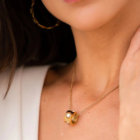 Collar Giratório Numeral Romanos Bañado en Oro 18K